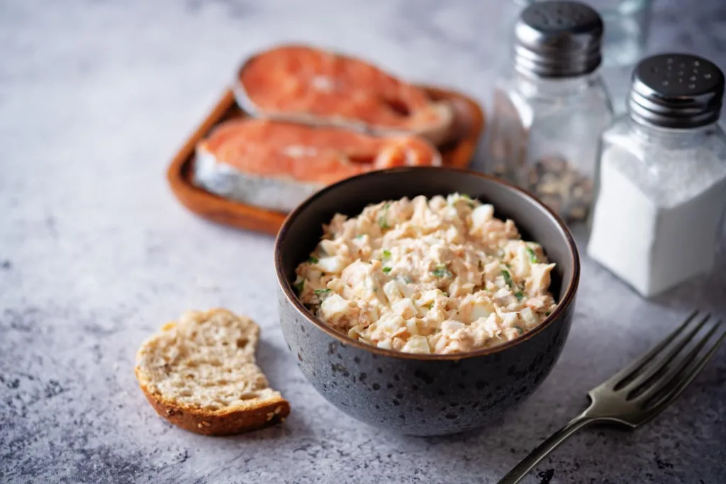 Fresh-made salmon mayonnaise salad with bread.